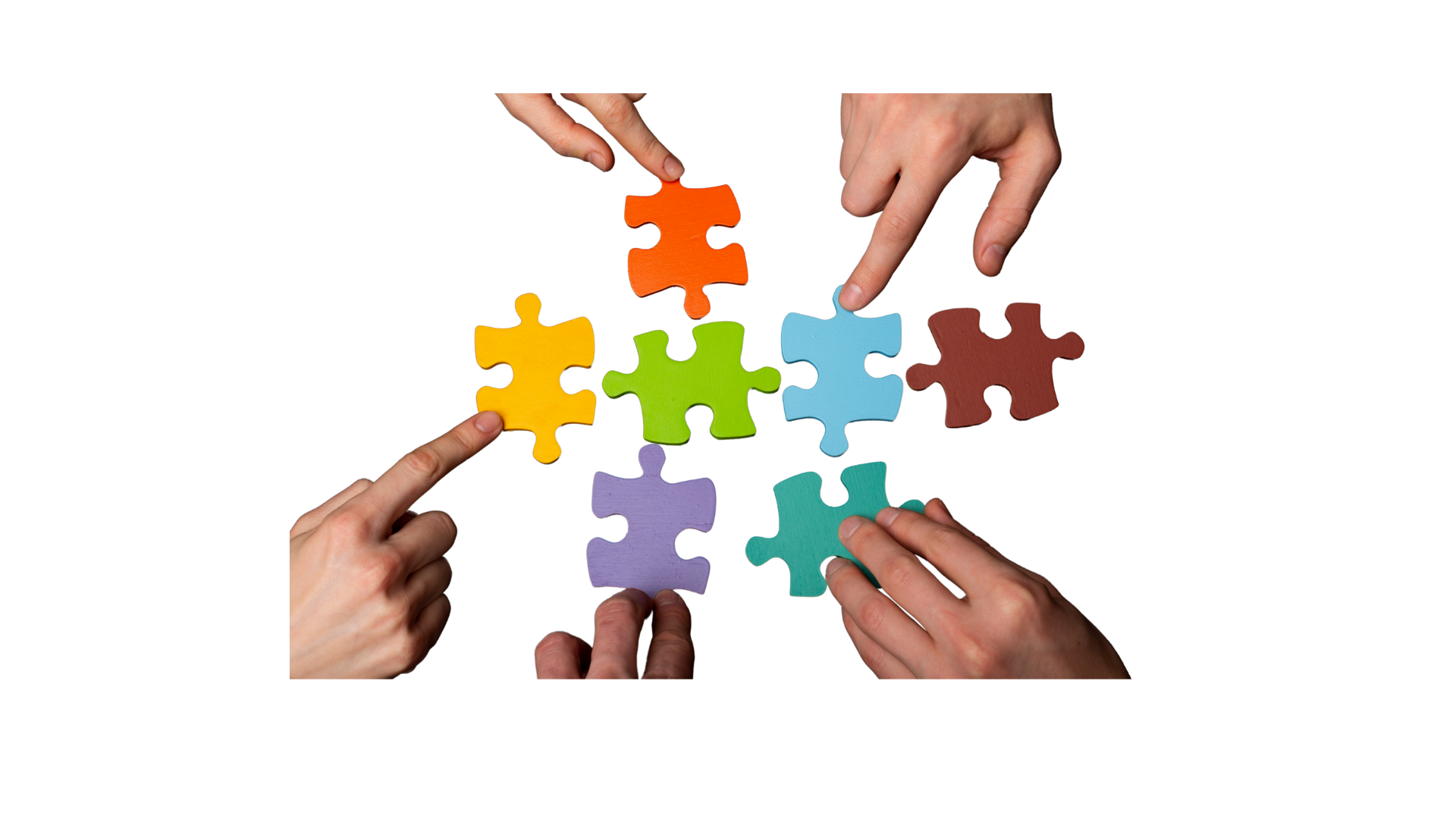 Colorful puzzle pieces being assembled by multiple hands representing custom solutions and collaboration